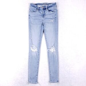 American Eagle Distressed Step Hem Jeggings 25 Light Wash